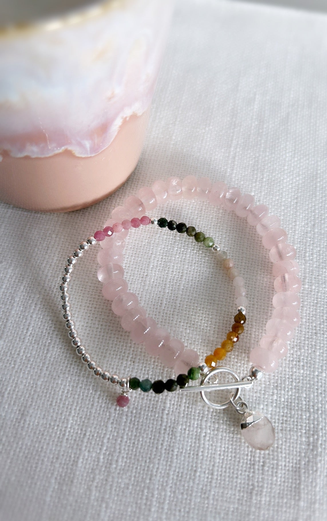 A beautiful sparkling Multi-tourmaline micro-faceted beaded bracelet in a pretty array of colours. In a Sterling Silver or Gold Filled finish, hand threaded on a jewellery stretch cord. 
