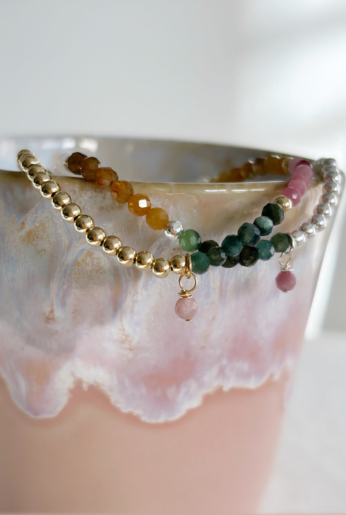 A beautiful sparkling Multi-tourmaline micro-faceted beaded bracelet in a pretty array of colours. In a Sterling Silver or Gold Filled finish, hand threaded on a jewellery stretch cord. 

