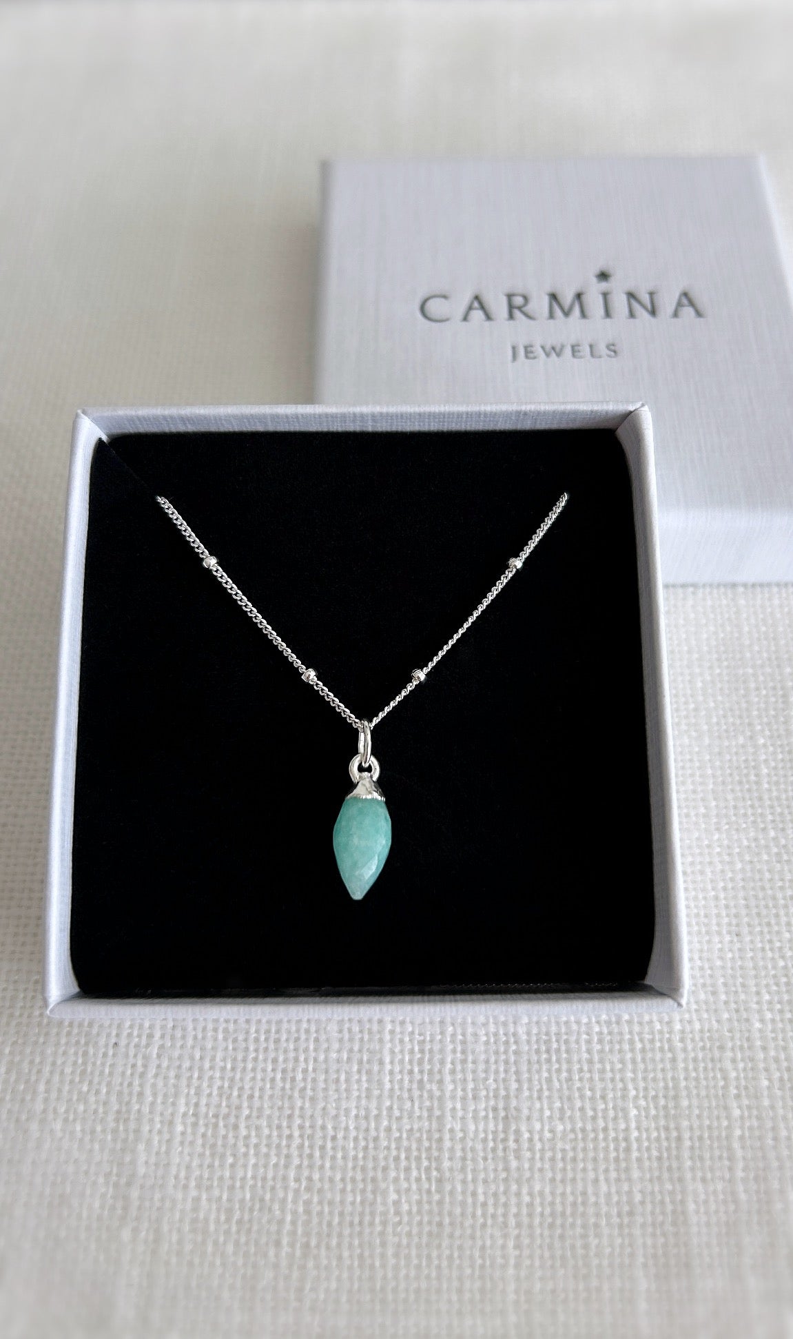 A beautiful sparkly Sterling Silver satellite chain necklace with a semi precious Amazonite marquise droplet charm ~ finished in a Sterling Silver setting.