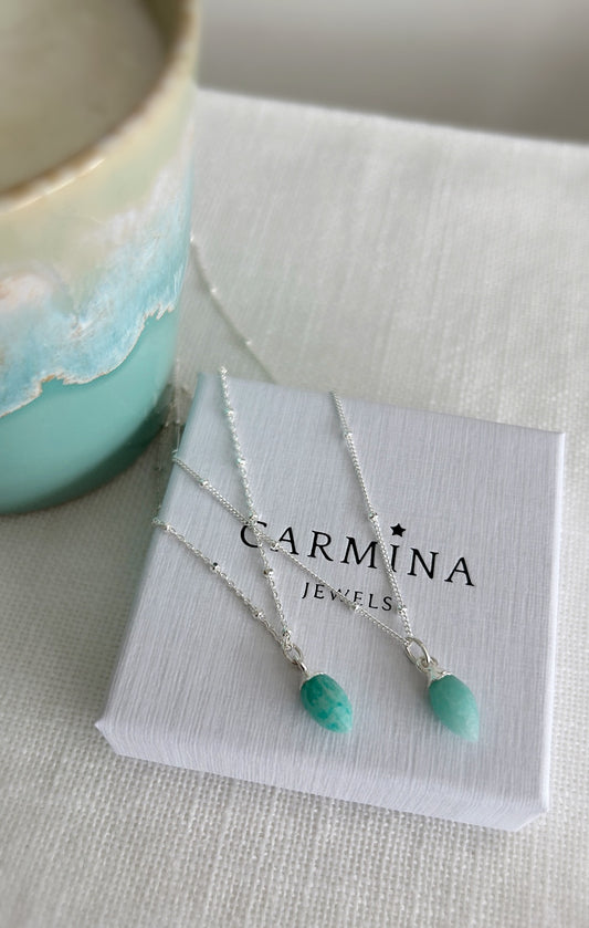 A beautiful sparkly Silver satellite chain bracelet with a semi precious Amazonite marquise droplet charm. 

