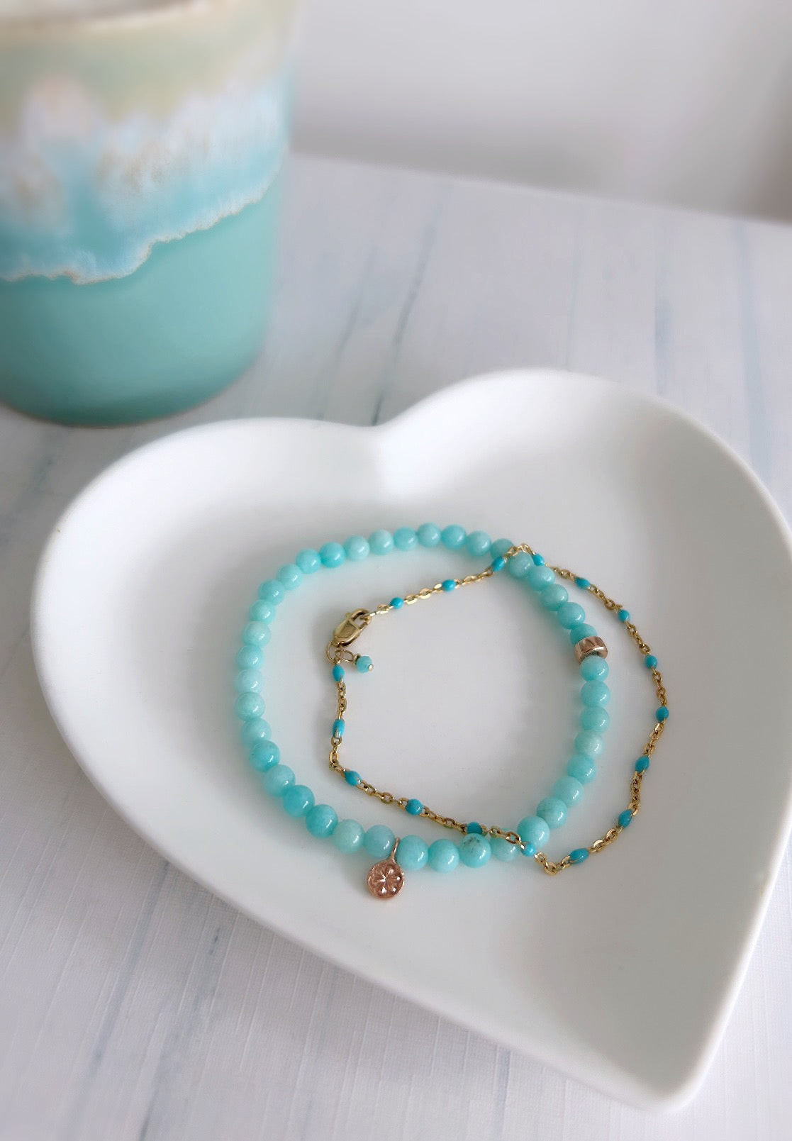 pretty semi precious beaded Amazonite stacking bracelet with a dainty daisy charm in a choice of either a Sterling Silver or Rose Gold Vermeil finish hand threaded on a stretch cord