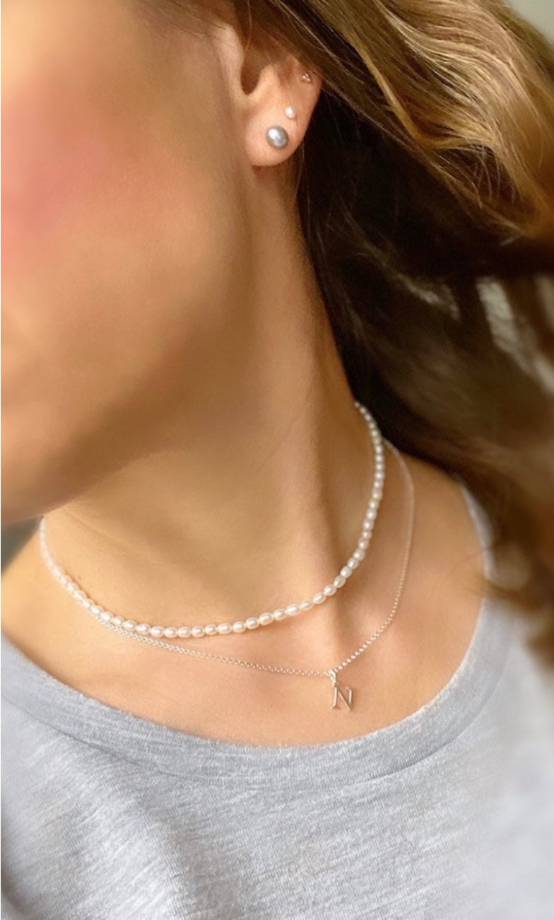 Freshwater seed Pearl choker style Necklace with a Sterling Silver or Gold Filled lobster clasp.